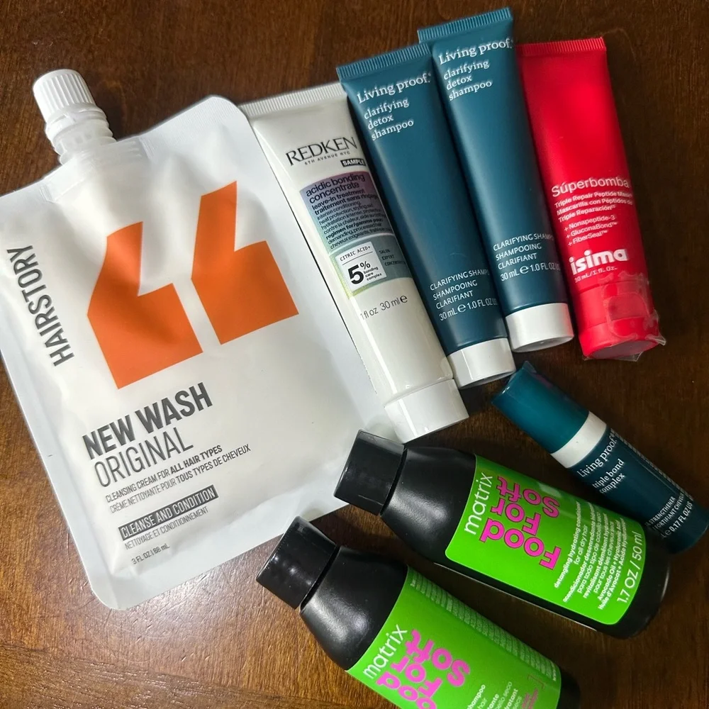 Living Proof clarifying detox shampoo teal and multiple hair care samples